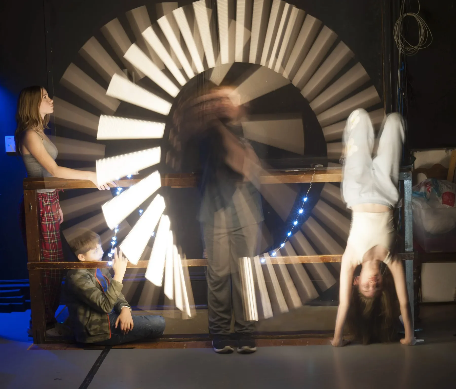 Students creating a light painting installation